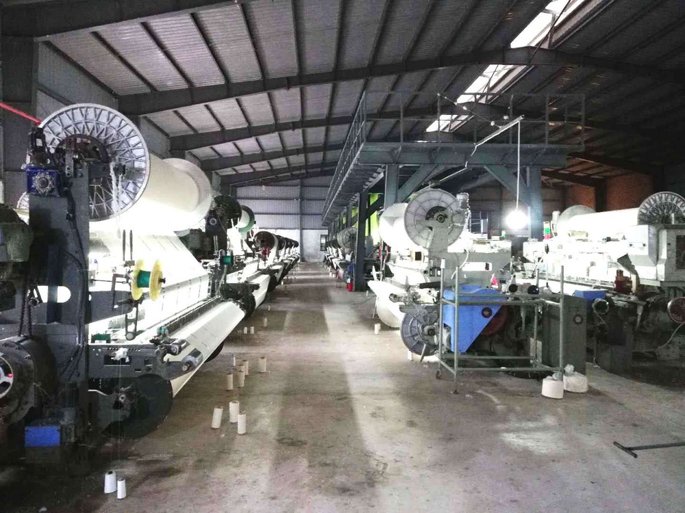 Illustrative image of a towel-weaving production line